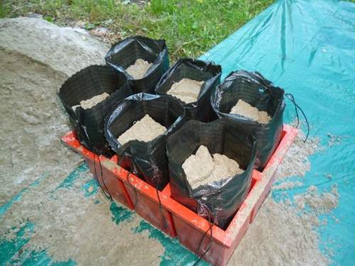 FüllFux Vorrichtung zum Füllen von Sandsäcken rot, inkl. 100 Stück Sandsäcke